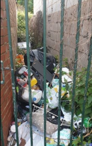 Rubbish dumped in Molineux Alley, Whitmore Reans, Wolverhampton.