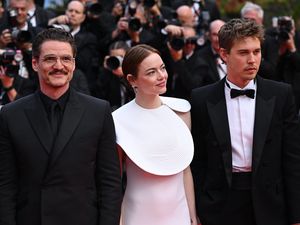 Pedro Pascal, Emma Stone and Austin Butler attend the premiere for Eddington at the 78th Cannes Film Festival in Cannes, France