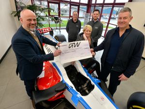 Supporting image for story: Ashley Giles receives charity cheque from Bridgnorth company