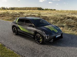 Supporting image for story: Hot Kia EV4 GT breaks cover on firm’s new ‘GT Wrap’ prototype testing mule