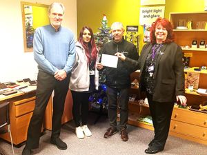 Supporting image for story: Black Country sight loss charity handed £5,000 donation by manufacturing firm