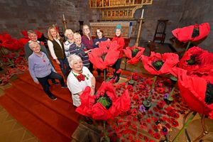 Shropshire Federation of Women's Institutes have decorated Shrewsbury Abbey with a mass of poppies for Remembrance Sunday.