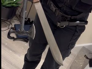 Supporting image for story: See the moment Telford police find machete and axe in dawn drug raid