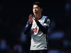 Son Heung-min applauds the fans