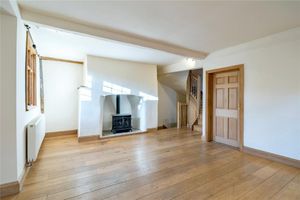 The living area, which has a wood-burning stove.