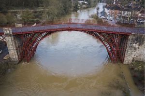 The rising Severn at Ironbridge was kept at bay by teams who erected defences