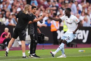 Aston Villa's Amadou Onana (right) celebrates scoring their side's first goal of the game during the Premier League match at the London Stadium. Picture date: Saturday August 17, 2024.