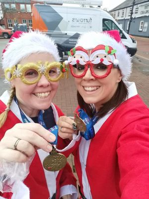 Natalie New and Marie Ellis at the Oswestry Santa Run