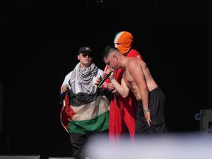 Supporting image for story: Kneecap lead Glastonbury crowd in chants against Prime Minister Sir Keir Starmer