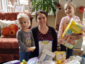 Supporting image for story: Nurseries hand over dozens of items to Telford Baby Bank
