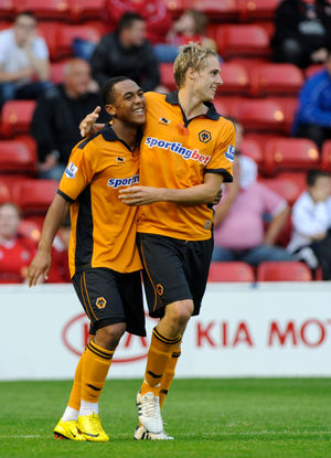 Ashley Hemmings (left) of Wolverhampton Wanderers celebrates after scoring to make it 0-1 with David Edwards of Wolverhampton Wanderers