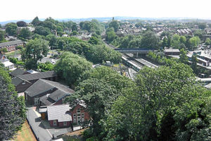 Looking to the south with the scout hut at front and the railway station behind