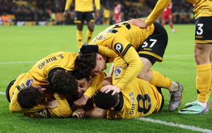 A pile on after the winner (Photo by David Rogers/Getty Images)