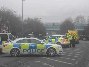 Supporting image for story: Delays in Tipton after man spotted sitting on ledge of bridge