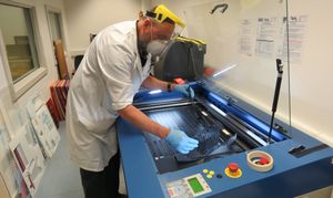 Gary Harbourne producing the visors in the engineeringdepartment at Hadley Learning Community