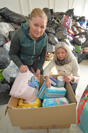 Family and friends collect donations to send to Turkey in the wake of the earthquake. Pictured is Fatima Guntac and Canan Hill