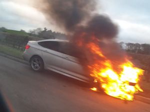 Supporting image for story: A5 north of Shrewsbury reopens after rush hour dramatic car fire leads to fluid spill