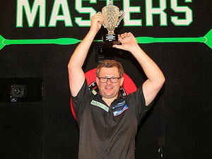 Supporting image for story: James Wade fires a stat attack for Grand Slam