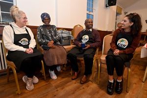 Volunteers Connie Fowler, Elma Bernard, Lloyd McKenzie and Mica Ahir get ready to welcome the guests