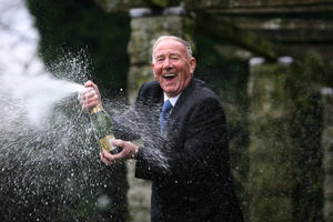 Vic Eden celebrates with Champagne
