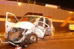 The Mercedes van following the smash.