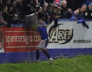 Jason Cowley is mobbed by Yeltz fans after his penalty. Pic: Steve Evans