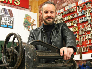 Supporting image for story: Shrewsbury shoe repairman steps into new shop