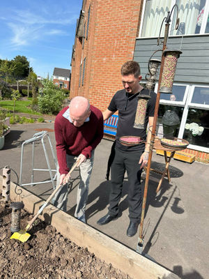 Residents at HC-One’s Littleton Lodge Care Home gardening 