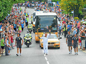 Supporting image for story: Thousands greet Stafford Olympic Flame relay