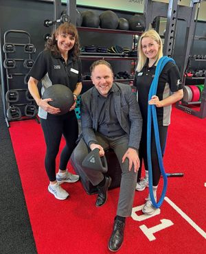 SLT Head of Operations, Mark Wildman, with Natasha Swingler (right) and Diane Hillier, from the Fitness Team at Portway Lifestyle Centre in Oldbury