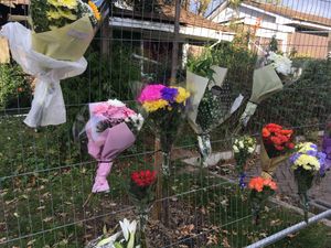 Supporting image for story: Tributes left at Telford bungalow after tragic blaze