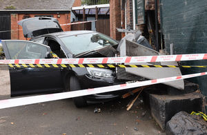 The wrecked car outside the Old Bush, Swindon, near Dudley