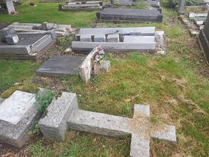 Supporting image for story: Anger as grave stones left lying flat