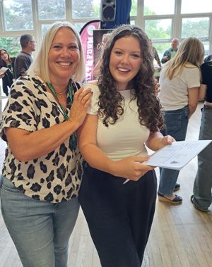 Mrs Dodd and Lillie-Mae Jones celebrating her Distinction star in Health and Social Care