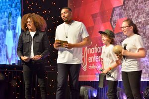 Former Diversity stars Perri Kiely and Jordan Banjo with pupils from Walton Priory Middle in Stone