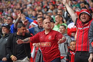 A Saddlers fans gees up the crowd