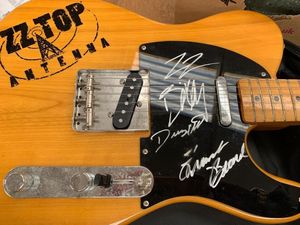 The ZZ top guitar signed by the band members