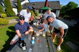 Oliver Smith, 3, enjoying the sun with Nial Devlin, Connor Sylvester, Jordan and Dean Smith