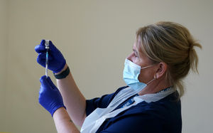 File photo dated 23/10/2021 of a nurse preparing a vaccine. None of the main childhood vaccines in England reached the 95% uptake target in 2024/25, new figures show. Some 91.9% of five-year-olds had received one dose of the MMR (measles, mumps & rub