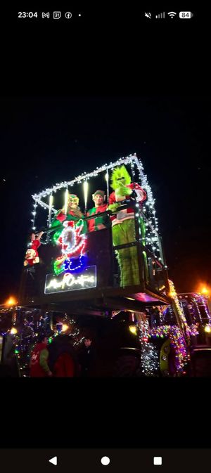 The crane containing Christmas elves and the Grinch at the Builth Wells event