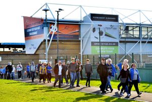 Supporters outside the Montgomery Waters Meadow