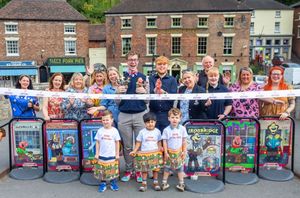 Councillor Ollie Vickers and animator Leo Wright, centre, officially launch a new art trail in Ironbridge.