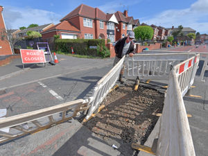 Supporting image for story: Dudley residents fear for their homes after yet another hole appears in 'unsafe' road