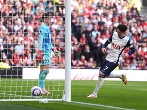 Son Heung-min celebrates scoring Spurs' equaliser against Bournemouth