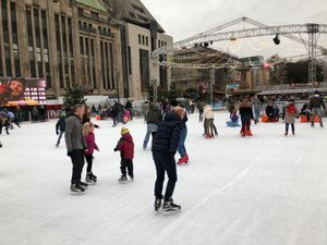 Ice skaters on the city centre outdoor ice rink
