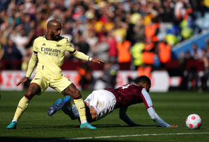 Arsenal's Alexandre Lacazette (left) and Aston Villa's Ezri Konsa (right)