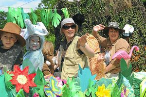 The mothers and toddlers group wave to the crowd
