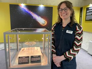 Lauren Collier with the ancient iron bead