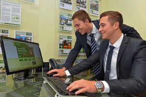 Jack Barnes and Luke Evans dive into work at the estate agents.