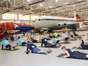 Supporting image for story: Runners warm up ahead of Spitfire 10k
